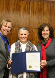 Local Support group co-leader Craig Lang, Mayor Kelli Linville and Marla Bronstein receive the 2015 declaration of ANAwareness week for Bellingham, Washington